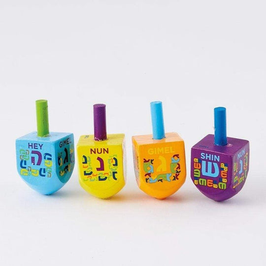 Four Small Painted Wood Dreidels