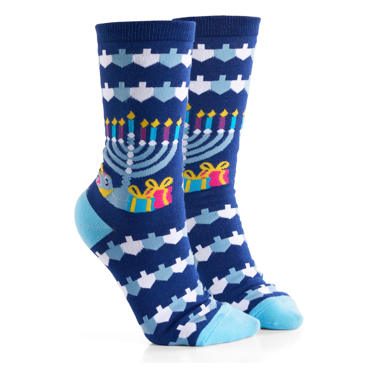 Pair of navy fair isle Hanukkah crew socks with menorah, dreidel and present motifs