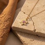 Petal Star of David necklace styled flatlay