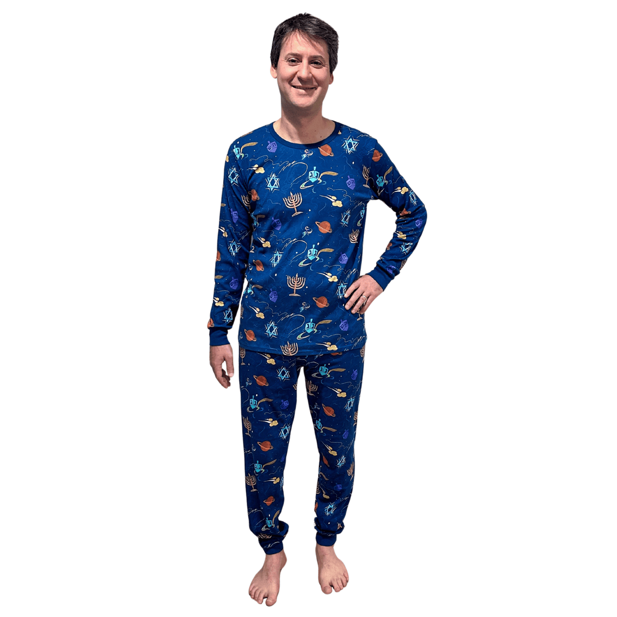 Adult wearing Hanukkah space pajamas by Midrash Manicures, full length
