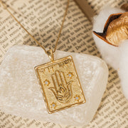 He Will Guard My Path pendant styled with a book