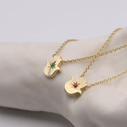 HOTCROWN - Floating Hamsa Gemstone Necklace with a Ruby or Emerald - 14k Yellow, Rose or White Gold - ModernTribe