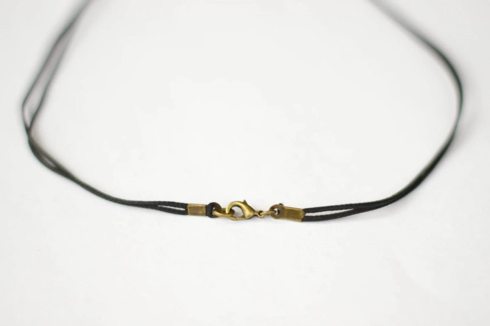 Shani and Adi Jewelry Necklaces Bronze Magen David Necklace on Black Cord