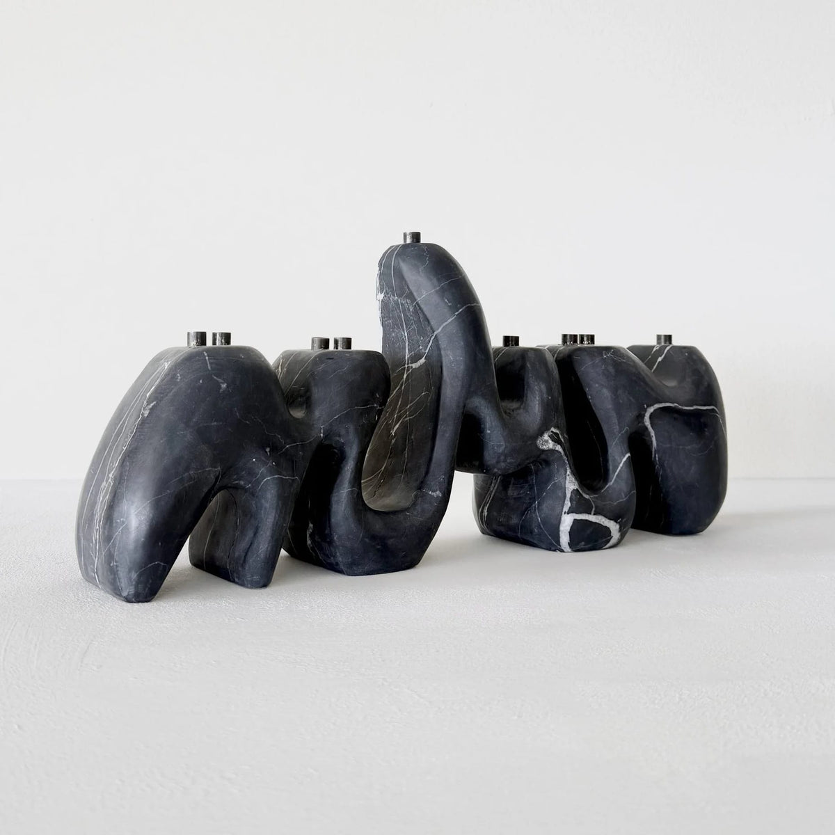 Hannah Polskin Menorahs Nero Marquina Menorah by Hannah Polskin