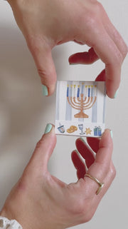 Happy Hanukkah matchbook opened to show the illustrated matches