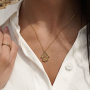 Eternal Pulse Hamsa necklace, worn