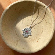 Eternal Pulse Hamsa necklace detail