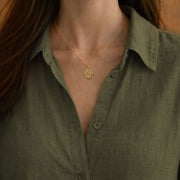 Radiant Anchor Hamsa necklace, worn