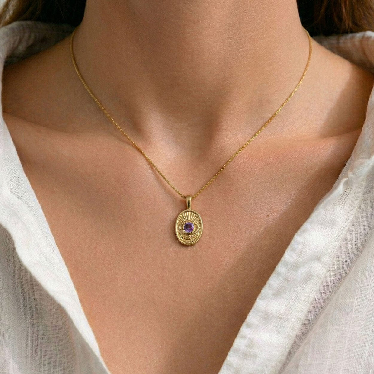 Window to the Soul necklace in 14k gold, worn
