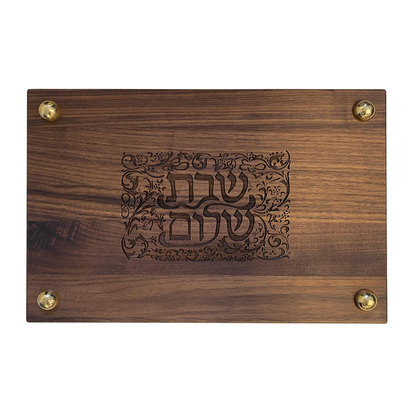 Shalom laser engraved in Hebrew lettering on a native Cherry wooden plaque that good measures 5.5 by 3.5 inches with the personalization option