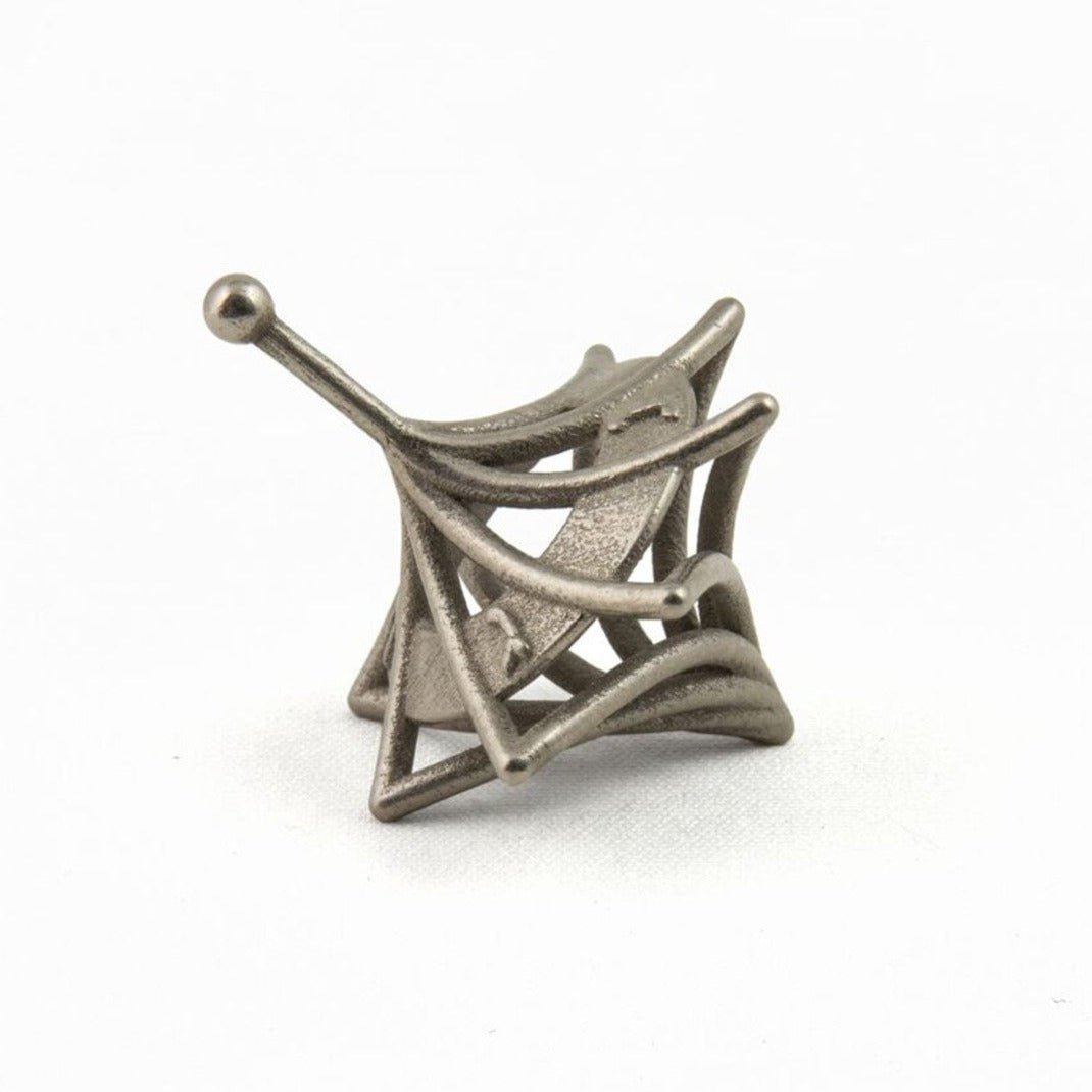 Joy Stember - 3D - Printed Twisted Caged Hanukkah Dreidel by Joy Stember - Gold or Nickel - ModernTribe