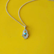 Emily Rosenfeld Necklaces Silver Tiny Hamsa Amulet by Emily Rosenfeld - Turquoise