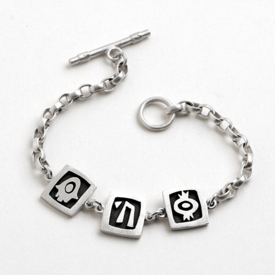Chai, Hamsa, Pomegranate Vignette Bracelet by Emily Rosenfeld