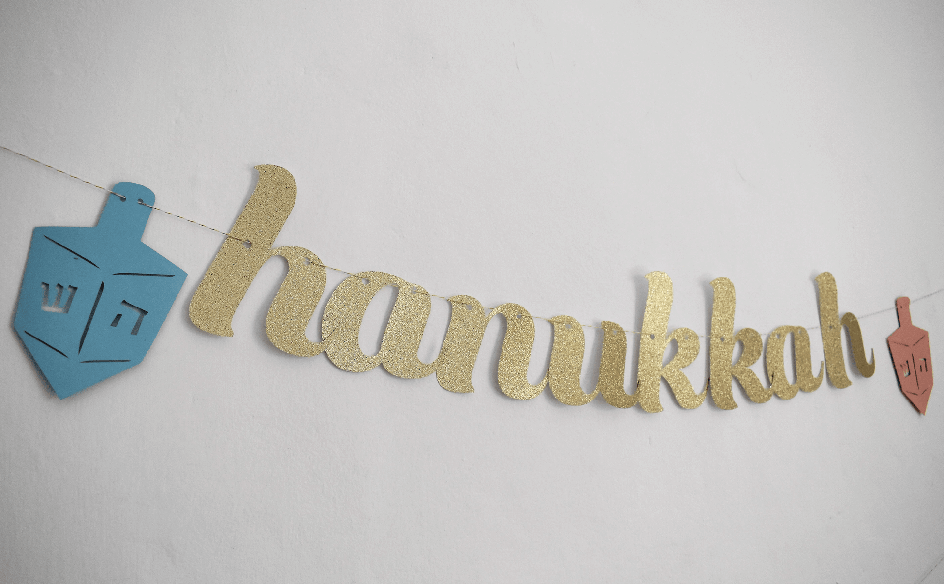 The KitCut Decorations Gold Glitter Hanukkah Banner with Side Dreidels