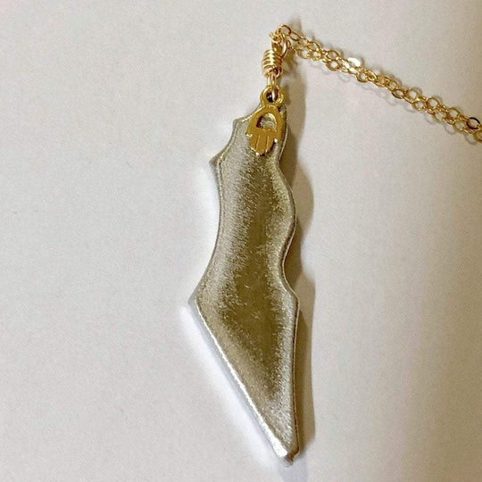 Rocket Hamsa Necklace: Turning Hate into Love